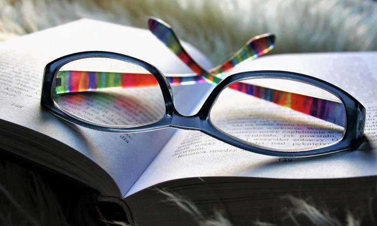 Glasses placed on an open book