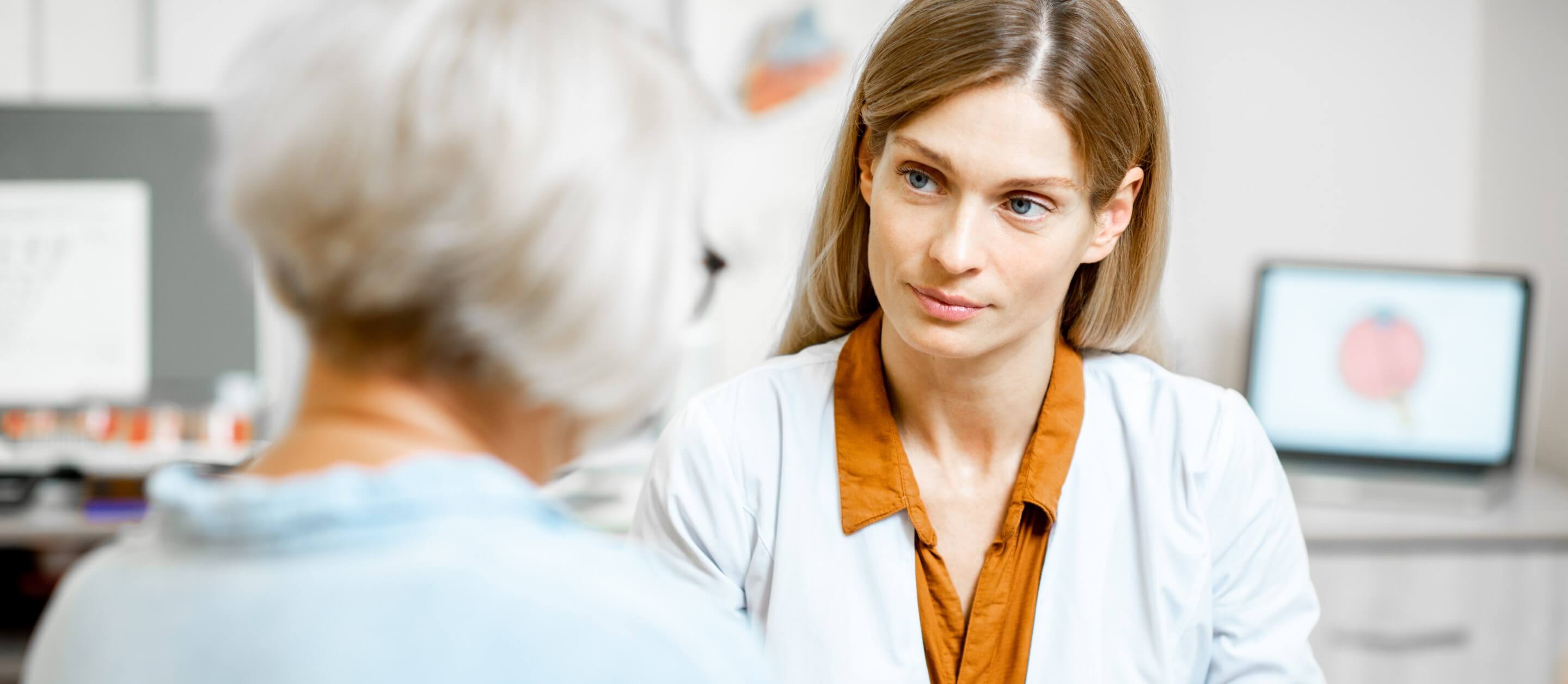 Female ophthalmologist consulting with a patient