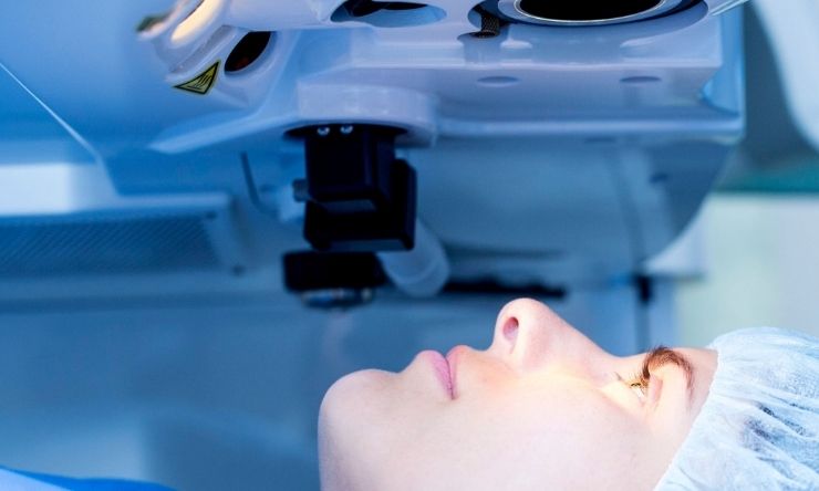 Patient lying in operation room ready for eye surgery