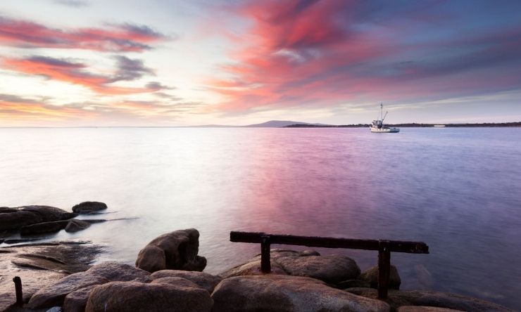 Image of remote shoreline and sunset