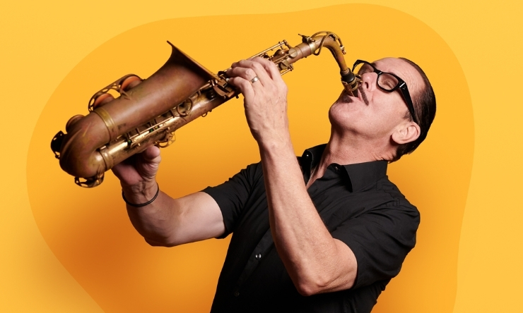 Image of Kirk Pengilly playing the saxophone