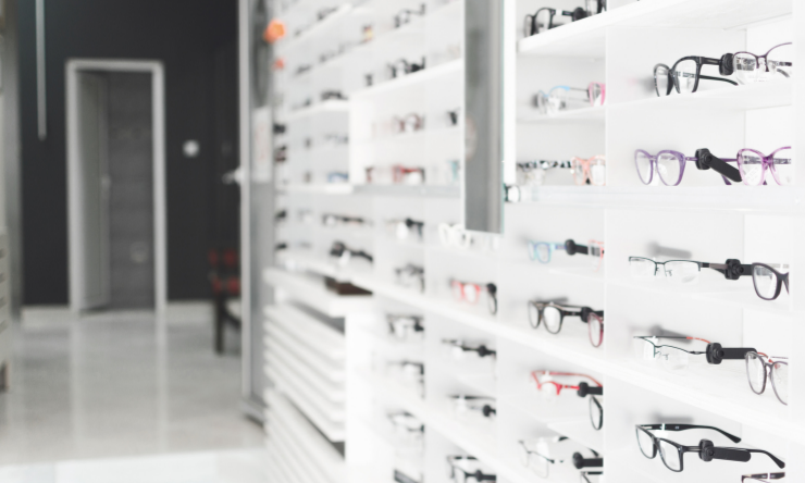 Image of a wall of spectacles at a optometrist
