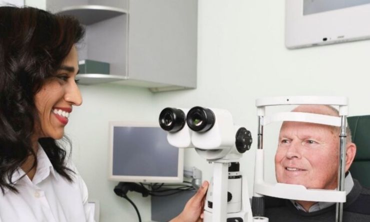 Optometrist Greeshma Patel with a patient