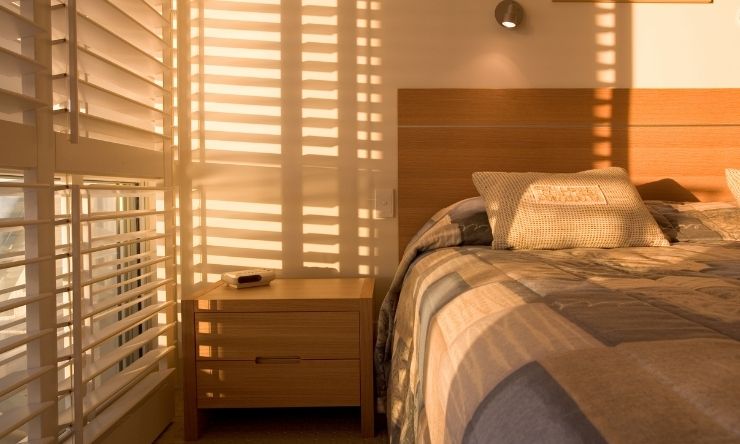 Image of bedroom with sun beams reflecting