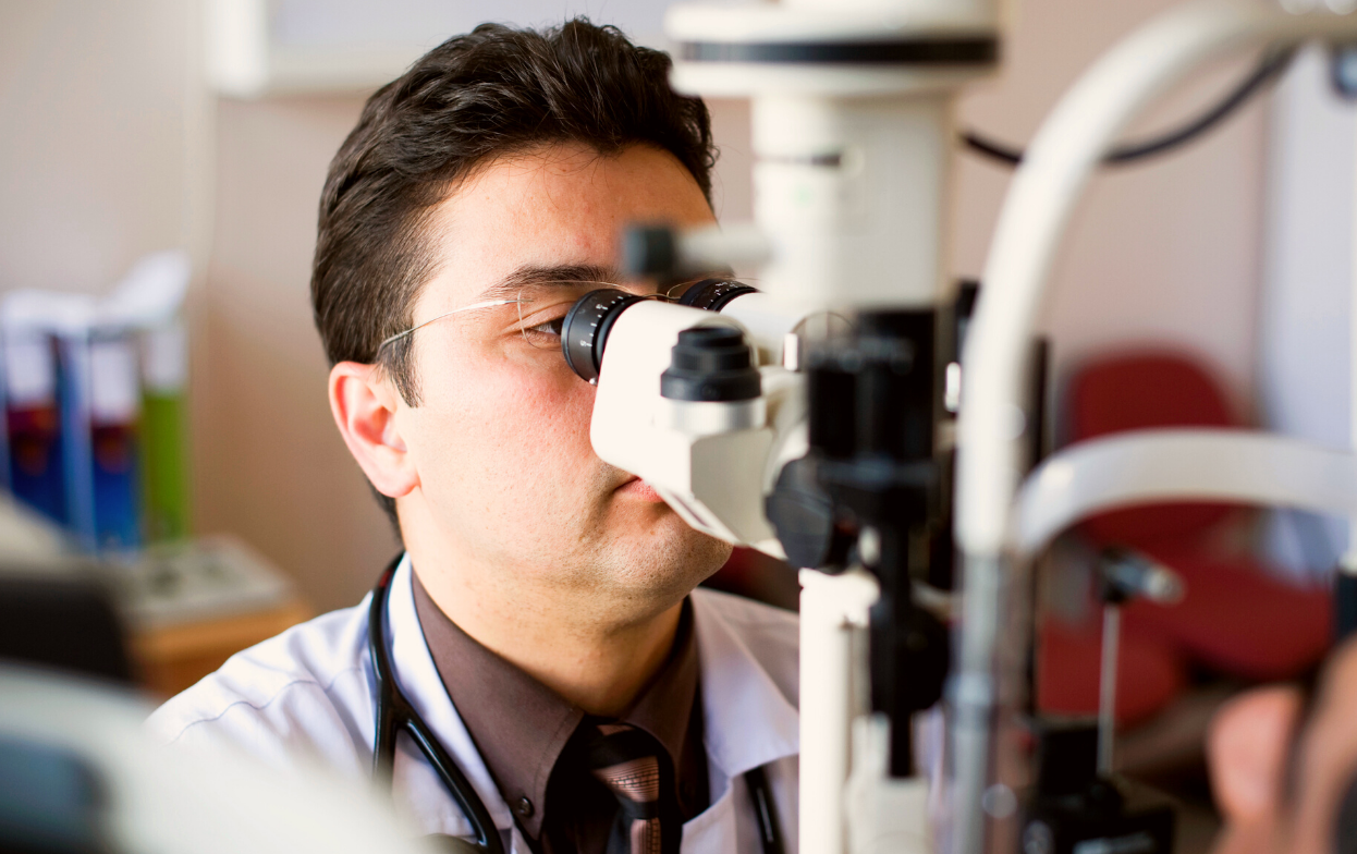 An optometrist performing a vision eye
