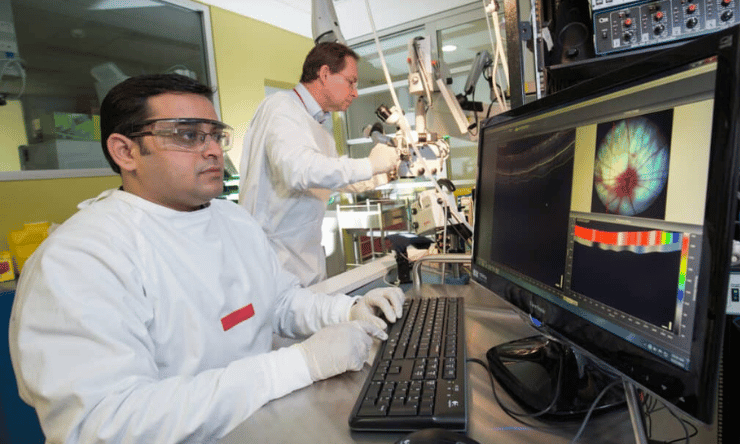 Macquarie ophthalmology researchers Dr Nitin Chitranshi and Professor Stuart Graham working in a lab