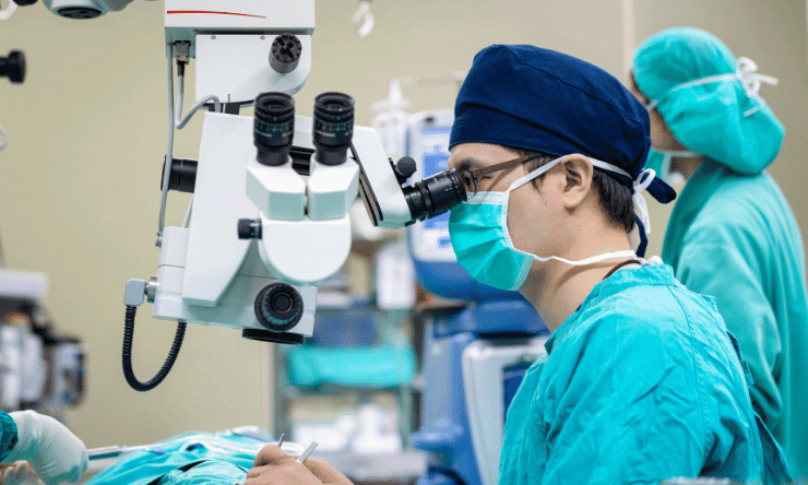 Eye surgeon performing a surgery. 