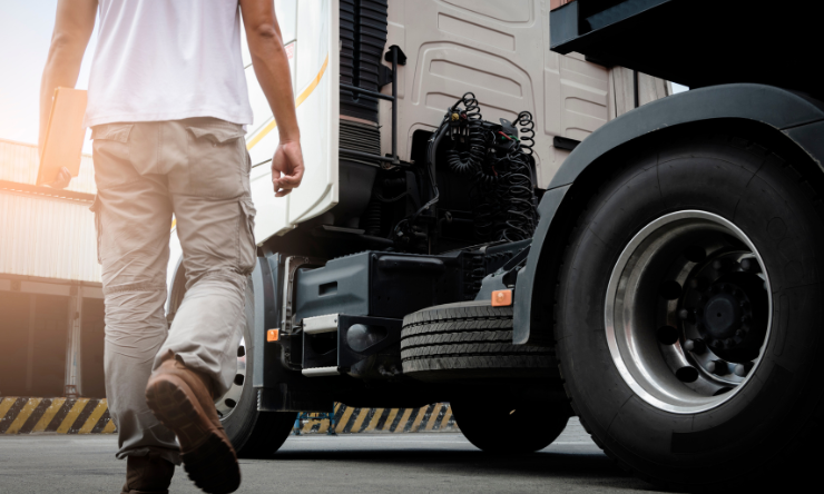 Man walking to his truck.