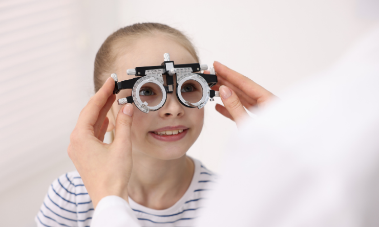 young girl getting her eyes checked