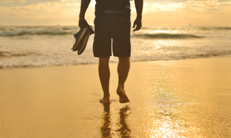 Man walking at beach