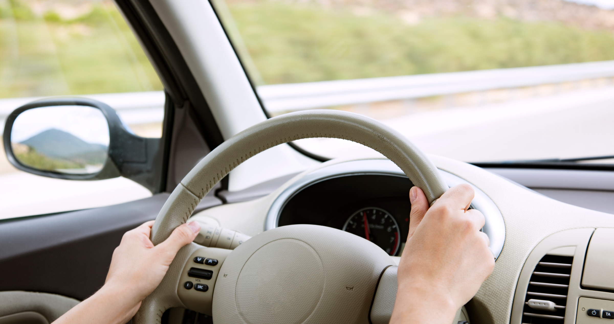 Image of a woman driving