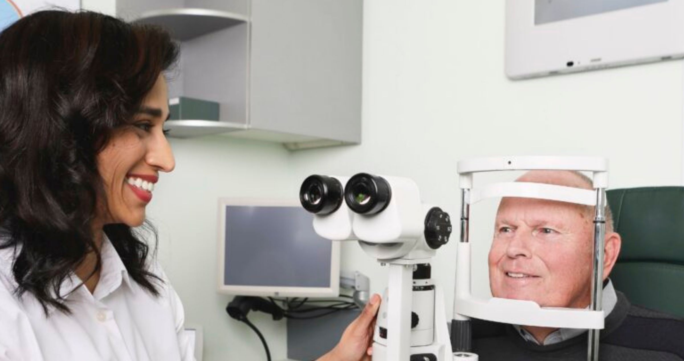 Optometrist Greeshma Patel with a patient