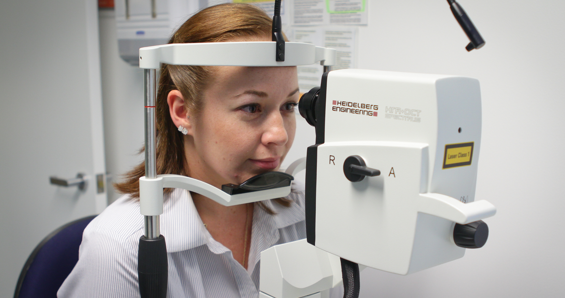 Image of a woman undergoing an OCT test