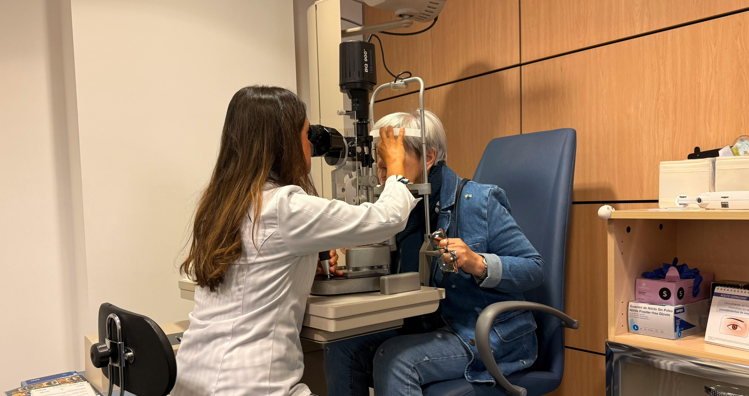 Optometrist and patient