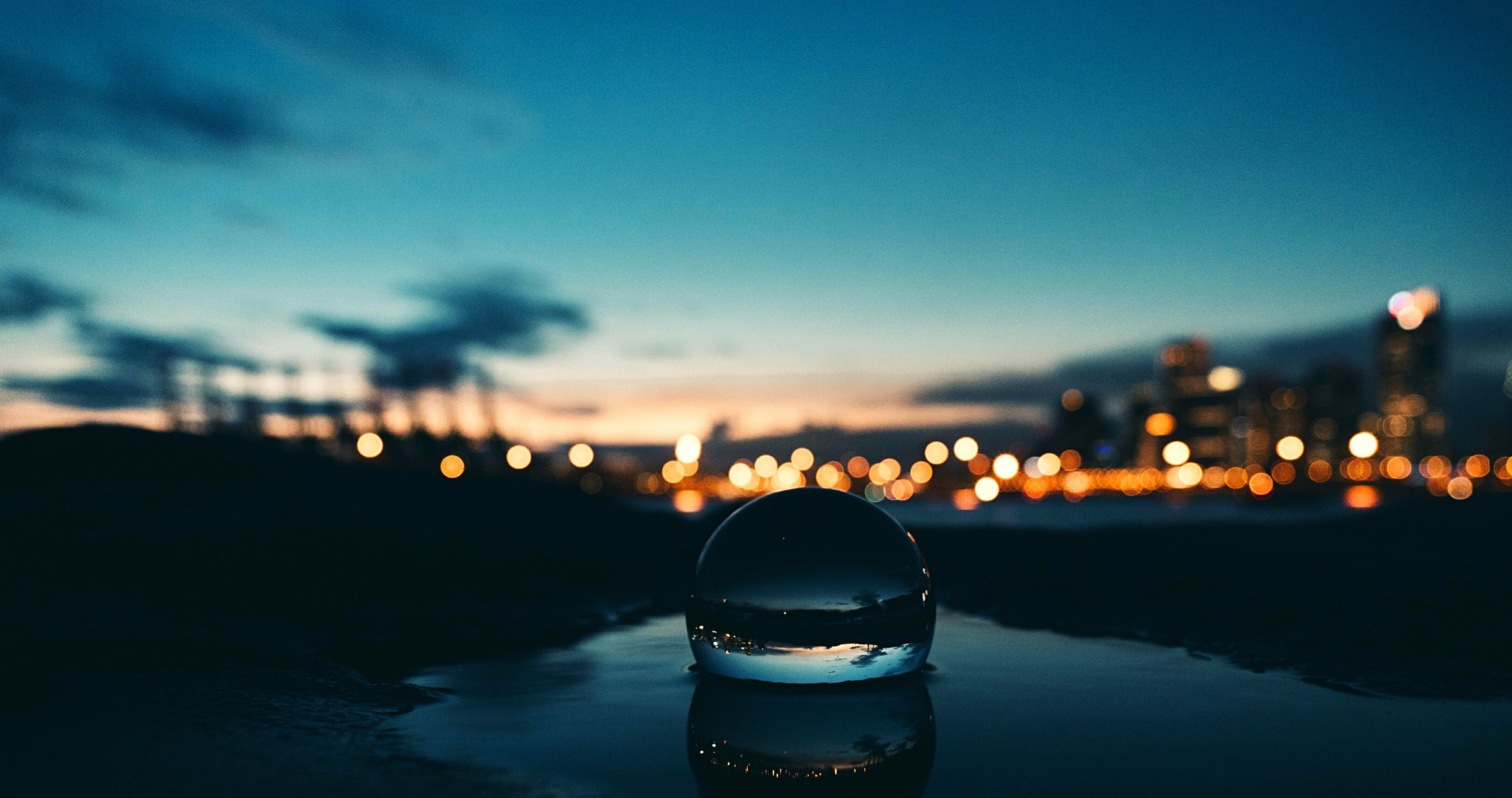 Image of crystal ball with an evening twilight background