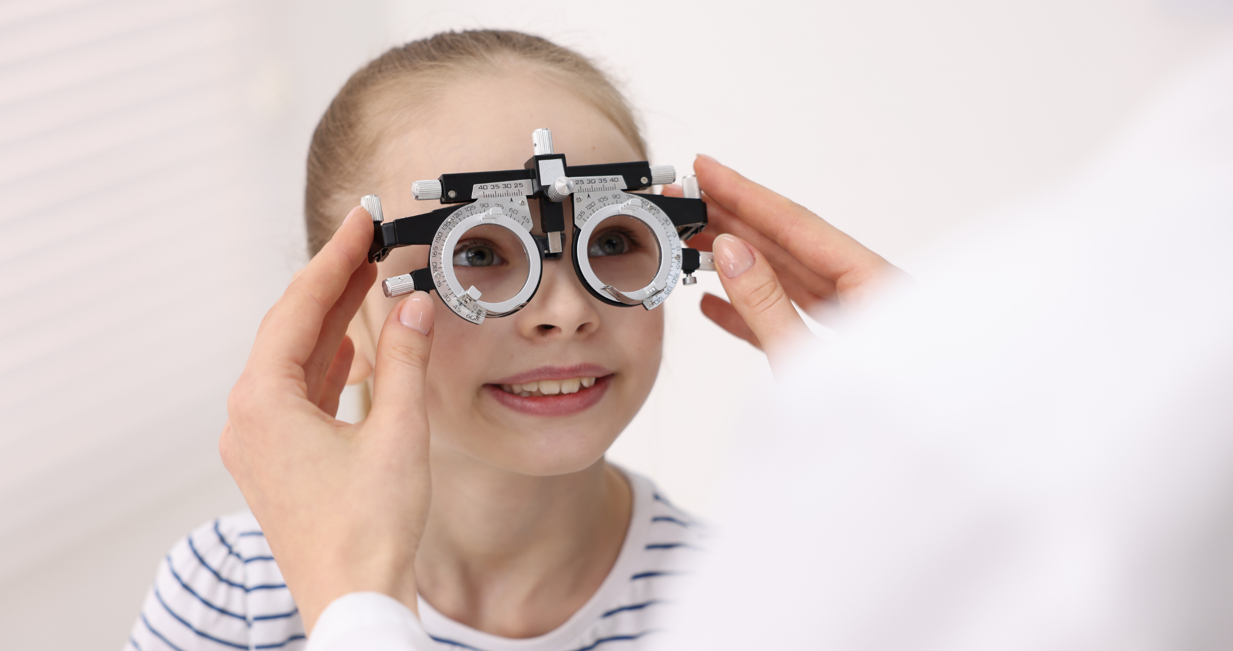 young girl getting her eyes checked